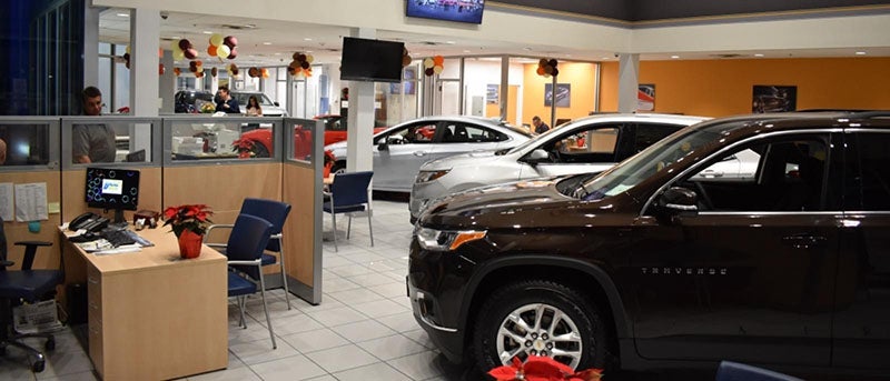 Dealership showroom showcasing the sales desks
