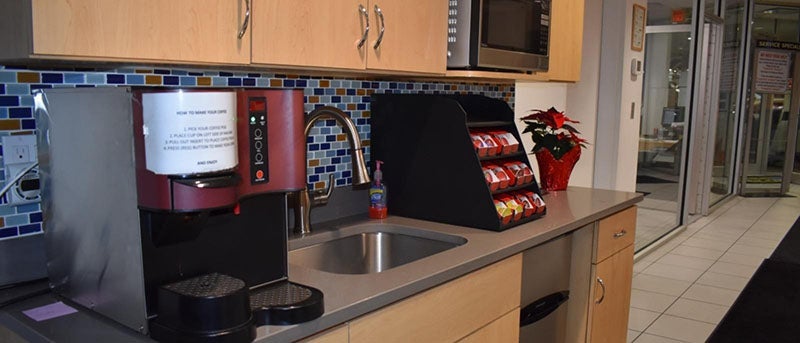 Dealership waiting area showcasing the coffee bar